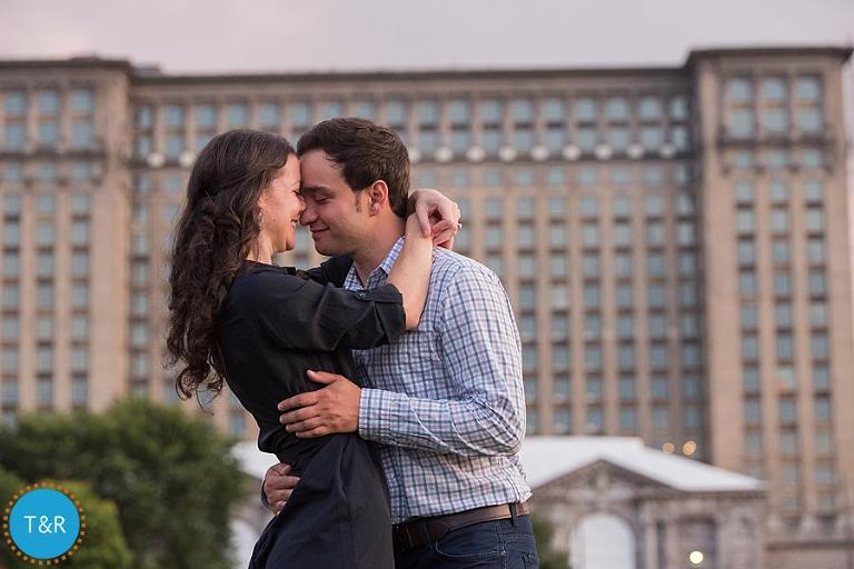 A couple embraces in front of Detroit's historic train station