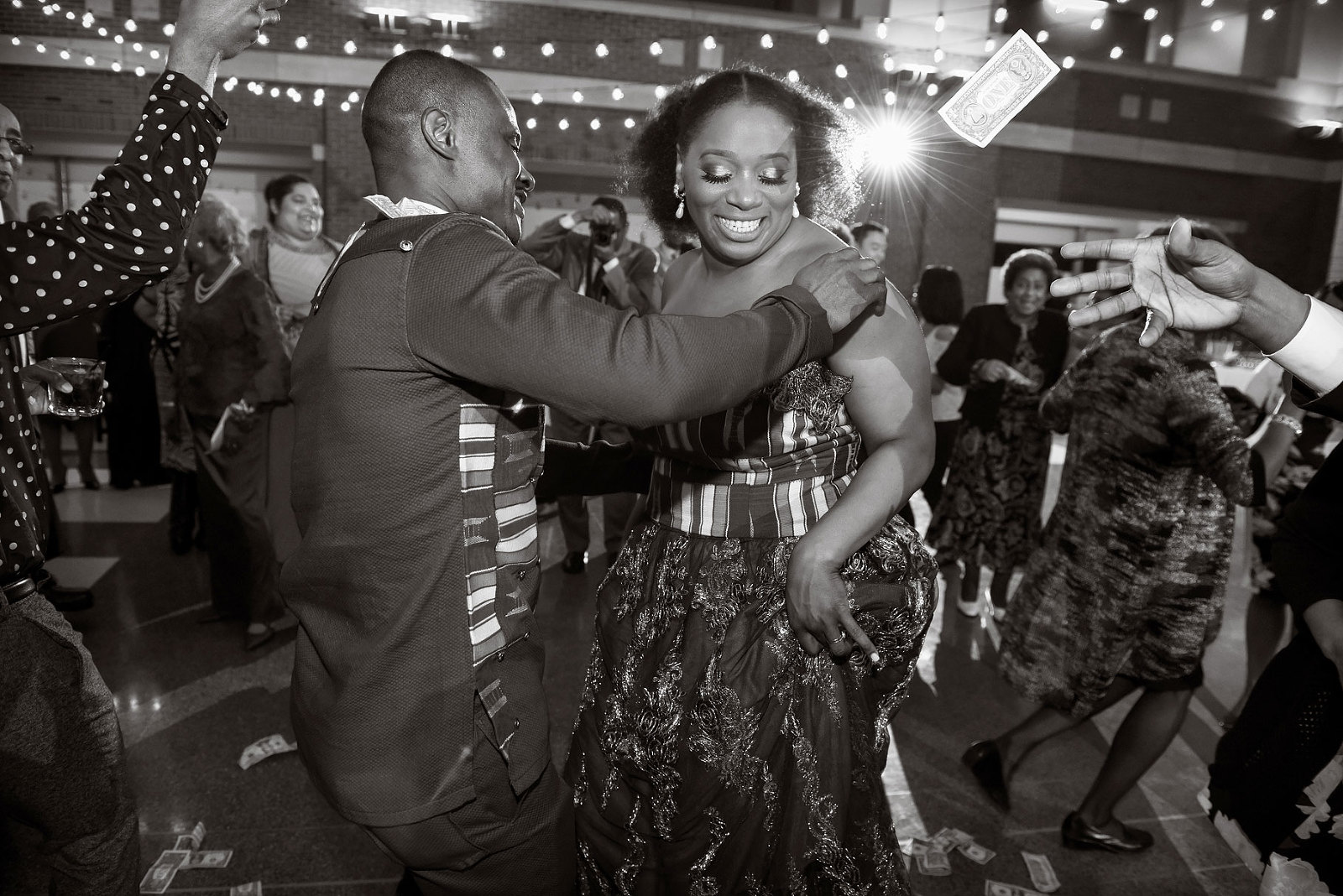 A couple has a festive first dance at their Rattlesnake Detroit wedding